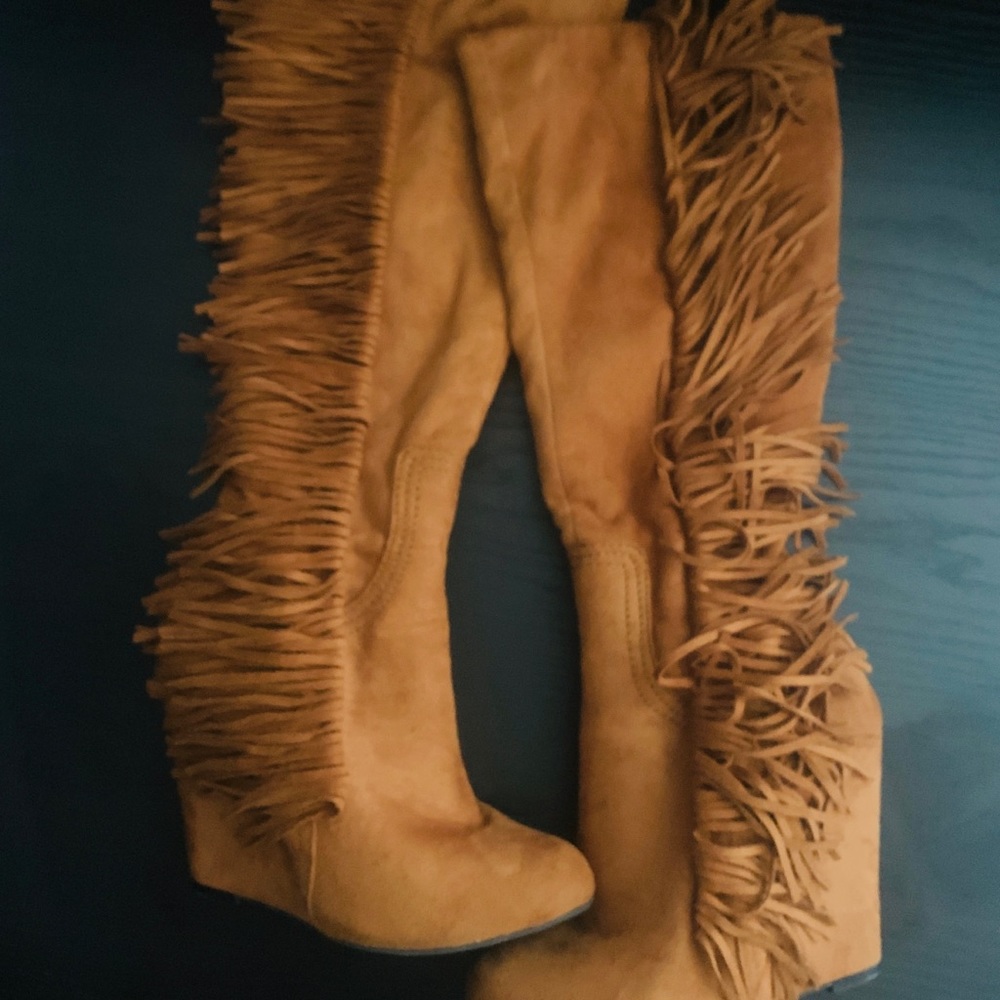 Suede fringe wedge boots